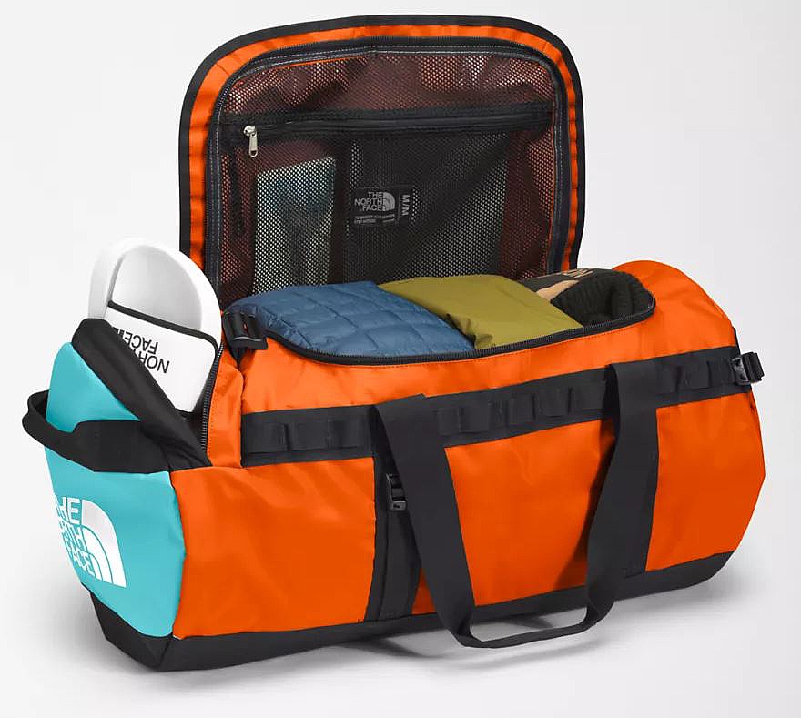taška The North Face Base Camp Duffel M Red Orange/Transantarctic